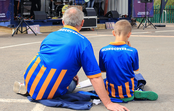 Shrewsbury Town fans proudly wearing their Technocover sponsored shirts