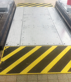 Anti-Slip Surface Applied to Access Cover Ramp