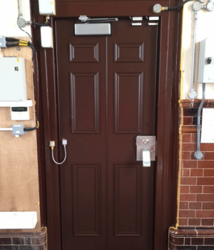 Single Leaf Sentinel Wood Effect Key Entry Door with Push Pad Exit